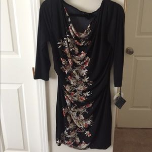 Macy’s form fitting black flowered dress M.